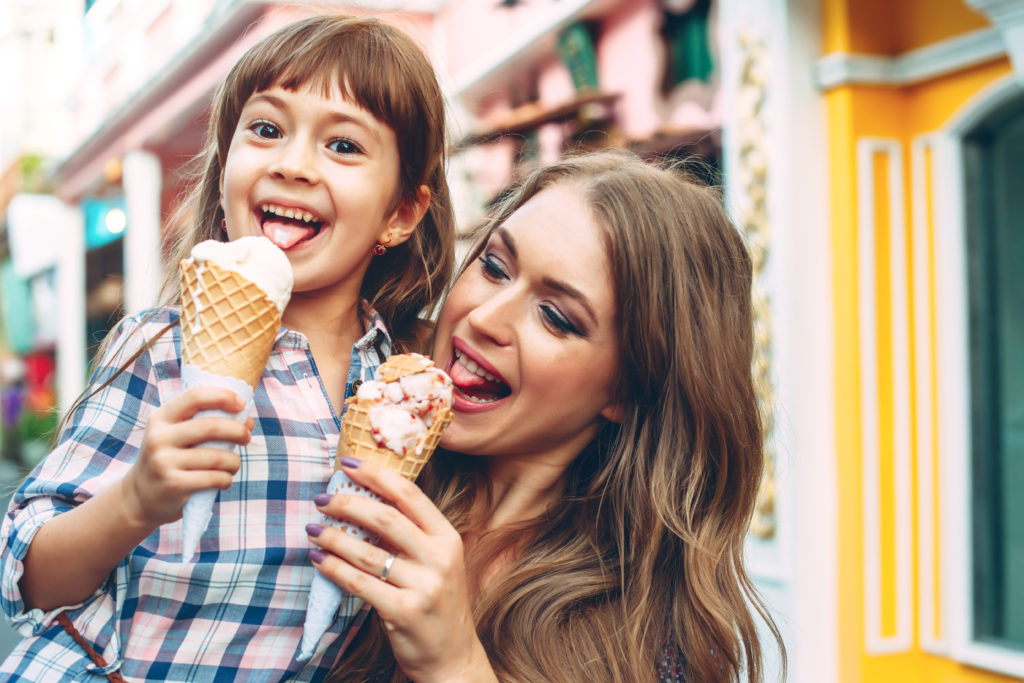 A woman and a child consume icecream